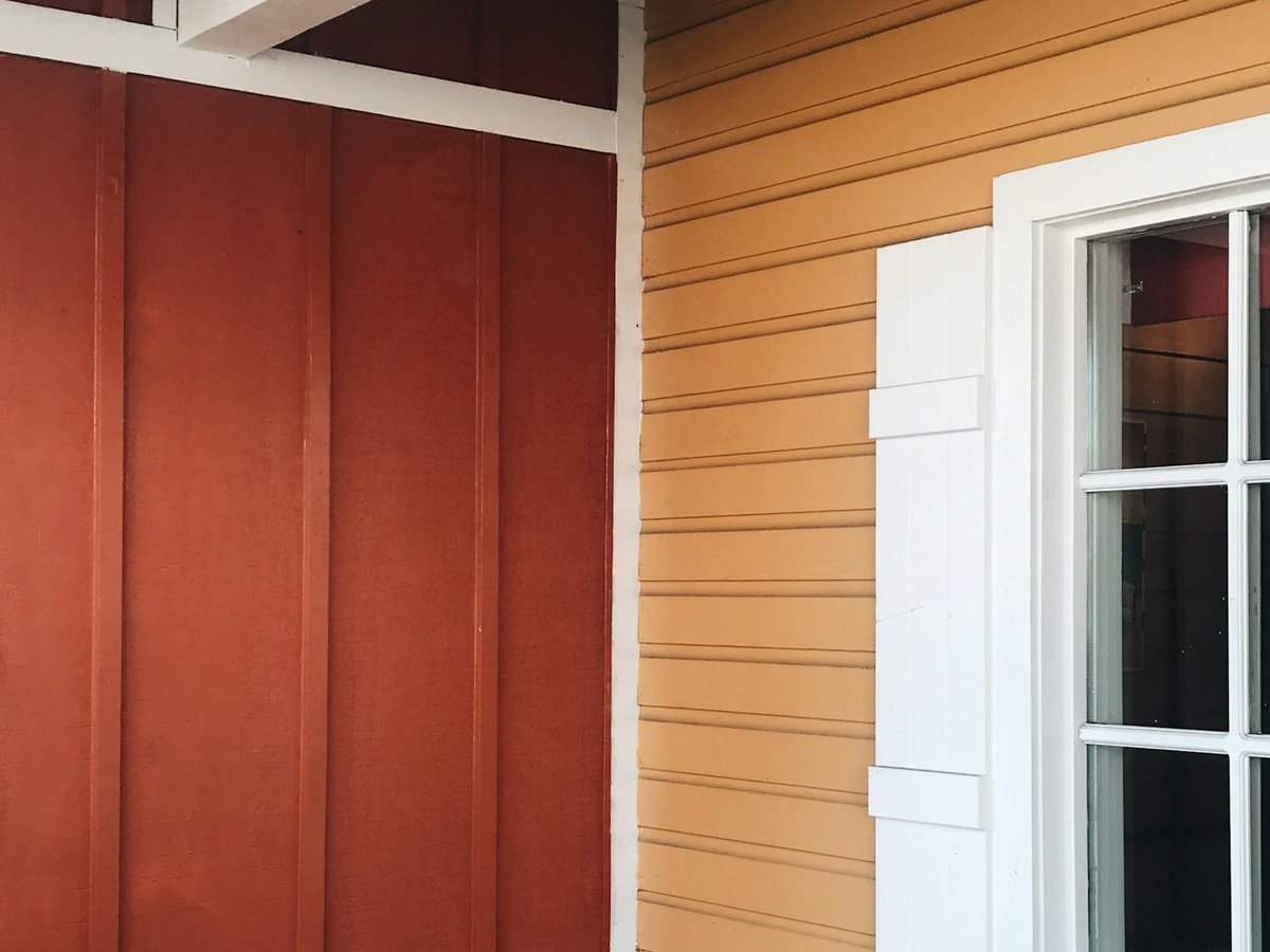 Lap siding and painted window trim on a house exterior